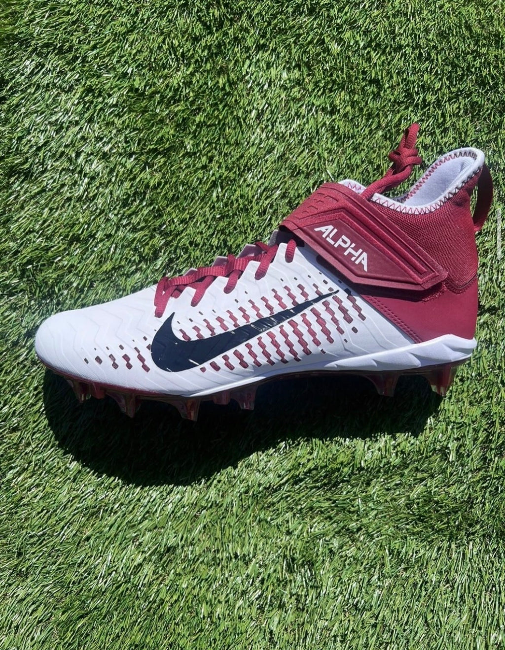 alpha nike  cleats