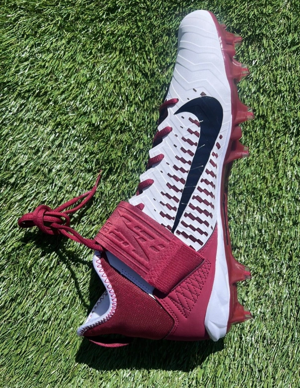 alpha nike  cleats